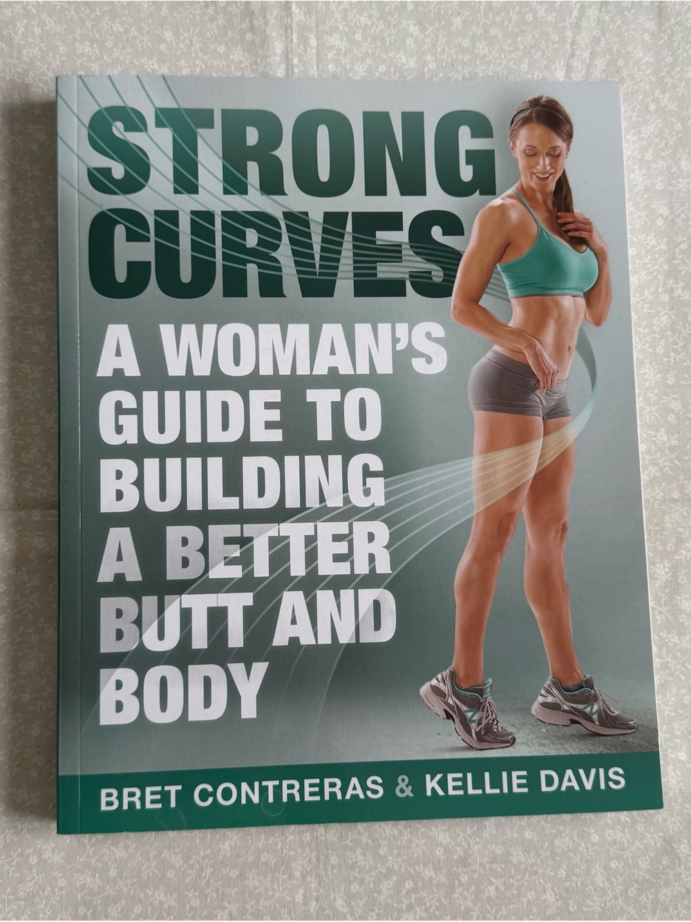 Strong Curves:A Woman's Guide To Building A Better Butt & Body by Bret Contreras